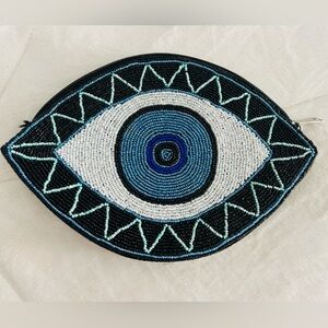 Handcrafted Beaded Eye Bag: Boho Clutch.